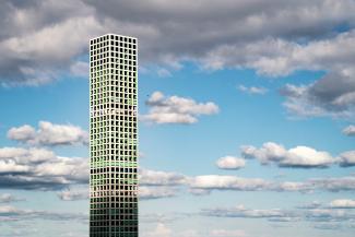 white high rise building by David Watkis courtesy of Unsplash.
