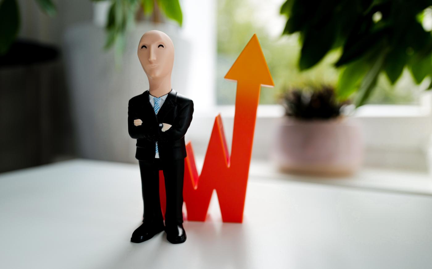 man in black suit jacket and black pants figurine by Gilly courtesy of Unsplash.